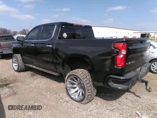 2019 Chevrolet Silverado 1500 High Country with VIN 1GCUYHEL1KZ360808, listed as a IAAI auction lot 42106243 with 158,061 mi miles. Bid and sale history available at carsss.com. Image 3.