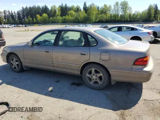 1998 Toyota Avalon XL with VIN 4T1BF18BXWU228989, listed as a Copart auction lot 53821495 with 157,209 mi miles and Salvage Title. Bid and sale history available at DreamBid. Image 2.