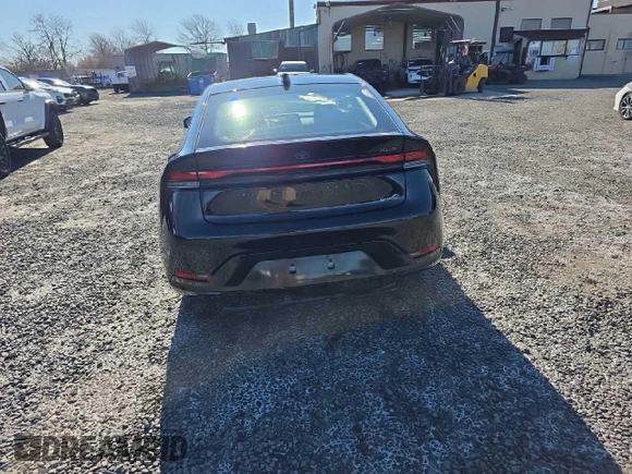2023 Toyota Prius LE z VIN JTDADABU7P3002593, wystawiony jako Copart lot #48176675 z przebiegiem 10 726 mil mil oraz Szkoda całkowita • Salvage title. Historia ofert i sprzedaży dostępna na DreamBid. Obrazek 6.