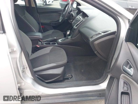 2013 Ford Focus SE z VIN 1FADP3F25DL189133, wystawiony jako IAAI lot #42438118 z przebiegiem 122 350 mil mil oraz . Historia ofert i sprzedaży dostępna na DreamBid. Obrazek 5.