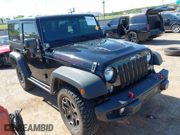2015 Jeep Wrangler Rubicon Hard Rock with VIN 1C4BJWCG1FL610028, listed as a IAAI auction lot 42318569 with 48,627 mi miles and . Bid and sale history available at DreamBid. Image 1.
