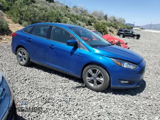 2018 Ford Focus SE z VIN 1FADP3FE1JL246725, wystawiony jako Copart lot #57913225 z przebiegiem 52 247 mil mil oraz Czysty tytuł • Clean title. Historia ofert i sprzedaży dostępna na DreamBid. Obrazek 4.