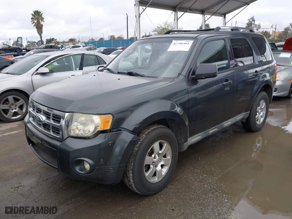 2009 Ford Escape Limited with VIN 1FMCU04759KB64236, listed as a IAAI auction lot 41796461 with 214,949 mi miles. Bid and sale history available at carsss.com. Image 2.