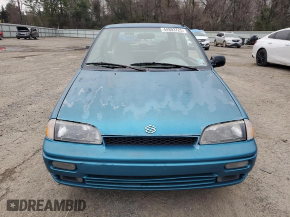 1993 Suzuki Swift z VIN 2S2AC35S5P6601869, wystawiony jako Copart lot #44993725 z przebiegiem 166 429 mil mil oraz Szkody całkowita. Historia ofert i sprzedaży dostępna na DreamBid. Obrazek 5.