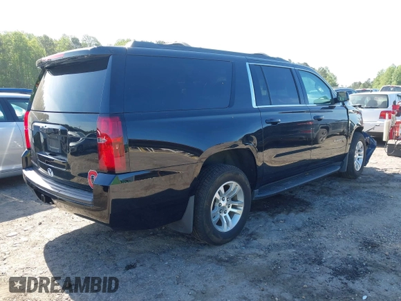 2019 Chevrolet Suburban LS with VIN 1GNSKGKC2KR353977, listed as a IAAI auction lot 42129814 with 85,454 mi miles and . Bid and sale history available at DreamBid. Image 4.