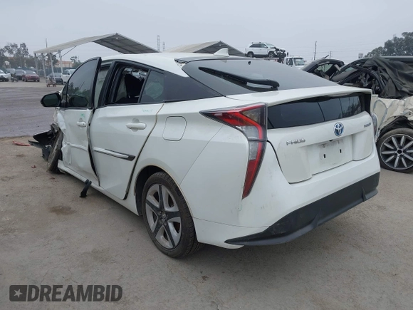 2016 Toyota Prius Four with VIN JTDKARFU4G3022953, listed as a IAAI auction lot 34510526 with Not provided miles and . Bid and sale history available at DreamBid. Image 3.