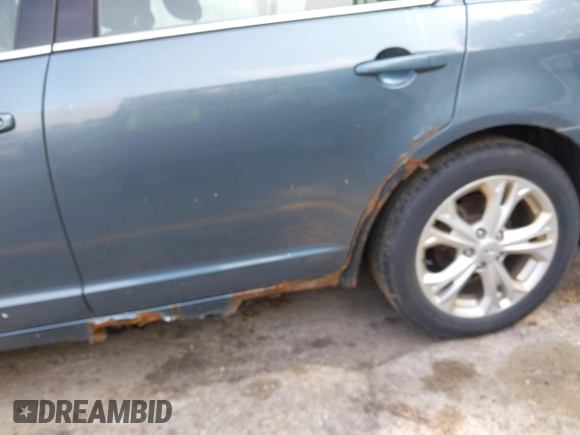 2012 Ford Fusion SE with VIN 3FAHP0HA5CR263705, listed as a IAAI auction lot 42583137 with 184,407 mi miles and . Bid and sale history available at DreamBid. Image 6.