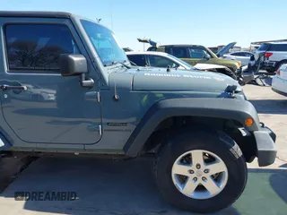 2014 Jeep Wrangler Sport with VIN 1C4AJWAGXEL177449, listed as a IAAI auction lot 41741519 with 117,056 mi miles and . Bid and sale history available at carsss.com. Image 19.
