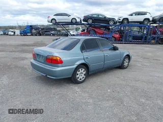 2000 Honda Civic VP with VIN 2HGEJ6614YH547366, listed as a IAAI auction lot 42059413 with 139,669 mi miles. Bid and sale history available at carsss.com. Image 4.