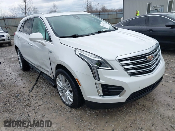 2019 Cadillac XT5 Premium Luxury FWD z VIN 1GYKNERS1KZ290754, wystawiony jako IAAI lot #41816074 z przebiegiem 91 585 mil mil oraz . Historia ofert i sprzedaży dostępna na DreamBid. Obrazek 1.