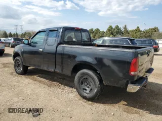 1999 Ford F-150 with VIN 1FTRX18W1XKC00918, listed as a Copart auction lot 53830305 with 205,205 mi miles and Salvage title. Bid and sale history available at DreamBid. Image 2.