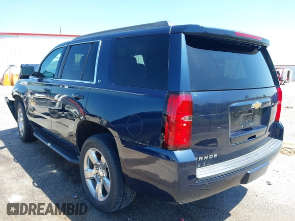 2018 Chevrolet Tahoe LT with VIN 1GNSCBKC0JR138385, listed as a IAAI auction lot 41977300 with 104,987 mi miles and . Bid and sale history available at DreamBid. Image 3.