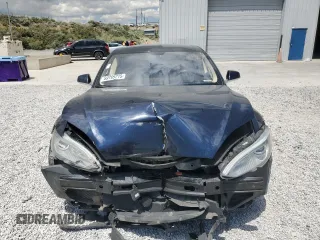 2014 Tesla Model S 60 with VIN 5YJSA1S12EFP29885, listed as a Copart auction lot 59769215 with Not provided miles and Salvage title. Bid and sale history available at DreamBid. Image 5.