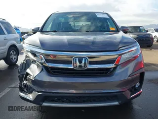 2019 Honda Pilot Touring 7-Passenger z VIN 5FNYF5H65KB020420, wystawiony jako IAAI lot #41575972 z przebiegiem 48 950 mil mil oraz . Historia ofert i sprzedaży dostępna na DreamBid. Obrazek 12.
