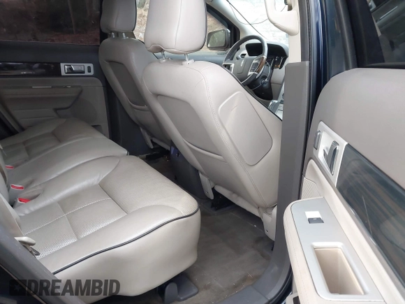 2009 Lincoln MKX with VIN 2LMDU88C99BJ07207, listed as a IAAI auction lot 41300392 with 218,185 mi miles. Bid and sale history available at carsss.com. Image 8.
