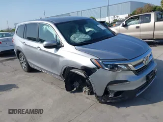 2021 Honda Pilot EX with VIN 5FNYF5H37MB014384, listed as a IAAI auction lot 42412500 with 36,934 mi miles and . Bid and sale history available at DreamBid. Image 1.