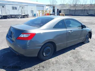 2010 Honda Civic Cpe LX with VIN 2HGFG1B63AH535237, listed as a IAAI auction lot 42070132 with 190,944 mi miles. Bid and sale history available at carsss.com. Image 4.