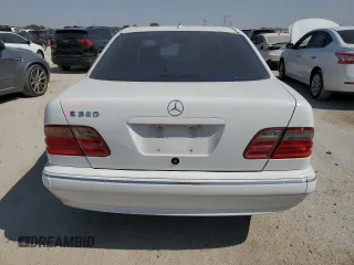 2000 Mercedes-Benz E-Class with VIN WDBJF65J5YB054237, listed as a Copart auction lot 76315974 with 95,092 mi miles and Salvage Title. Bid and sale history available at carsss.com. Image 6.