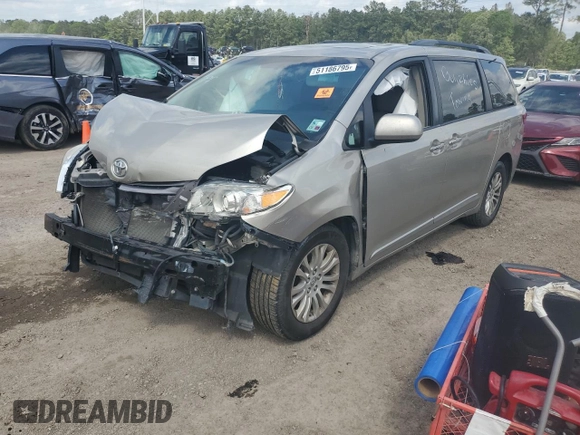 2016 Toyota Sienna XLE with VIN 5TDYK3DC0GS697468, listed as a Copart auction lot 51186795 with 128,851 mi miles and Salvage Title. Bid and sale history available at DreamBid. Image 1.