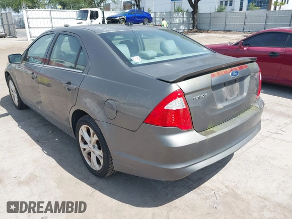 2012 Ford Fusion SE with VIN 3FAHP0HA4CR203446, listed as a IAAI auction lot 42093330 with 185,703 mi miles. Bid and sale history available at carsss.com. Image 3.