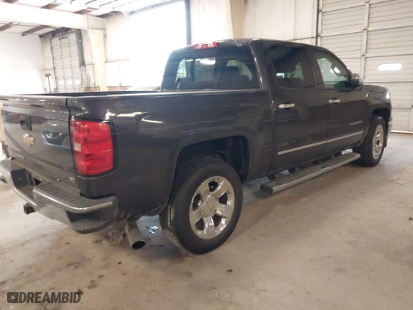 2014 Chevrolet Silverado 1500 LTZ with VIN 3GCUKSEC8EG257629, listed as a IAAI auction lot 41415515 with 167,904 mi miles. Bid and sale history available at carsss.com. Image 4.
