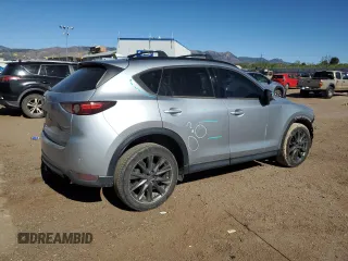 2019 Mazda CX-5 Grand Touring with VIN JM3KFADM6K0543888, listed as a Copart auction lot 56310785 with 112,737 mi miles and Salvage title. Bid and sale history available at DreamBid. Image 3.