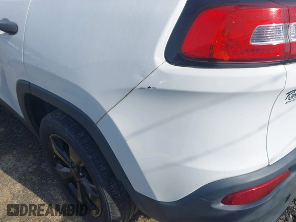 2016 Jeep Cherokee Altitude with VIN 1C4PJLABXGW323881, listed as a IAAI auction lot 42289189 with 147,631 mi miles and . Bid and sale history available at DreamBid. Image 19.