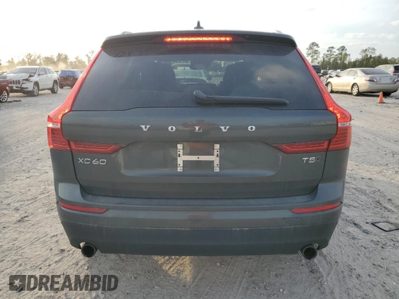 2018 Volvo XC60 Momentum with VIN LYV102RK0JB106389, listed as a Copart auction lot 82677454 with 114,832 mi miles and Salvage Title. Bid and sale history available at carsss.com. Image 6.
