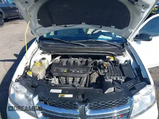 2014 Dodge Avenger SE z VIN 1C3CDZAB1EN116800, wystawiony jako IAAI lot #41668822 z przebiegiem 190 583 mil mil oraz . Historia ofert i sprzedaży dostępna na DreamBid. Obrazek 10.