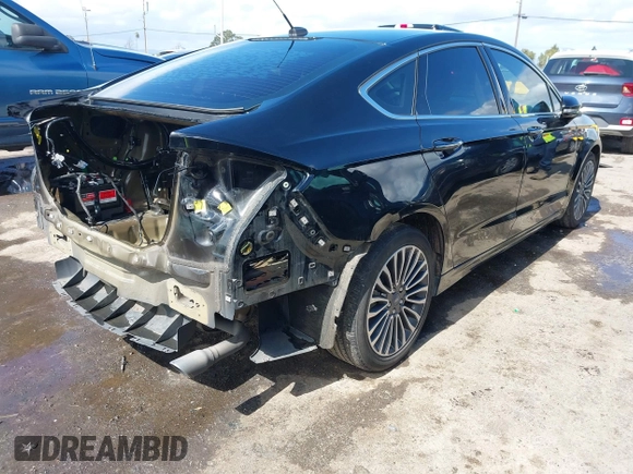 2017 Ford Fusion Titanium with VIN 3FA6P0SU0HR277268, listed as a IAAI auction lot 41798990 with 140,452 mi miles and . Bid and sale history available at DreamBid. Image 4.