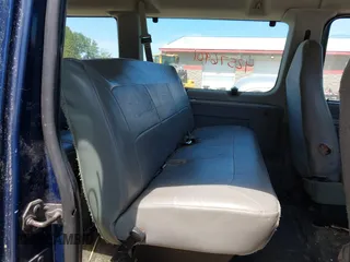2007 Ford Econoline Passenger XL z VIN 1FMNE11W57DB28135, wystawiony jako IAAI lot #42576901 z przebiegiem 143 458 mil mil oraz . Historia ofert i sprzedaży dostępna na DreamBid. Obrazek 8.