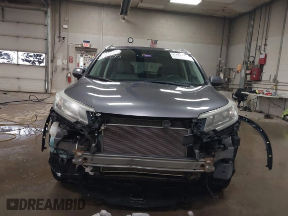 2015 Honda CR-V EX-L with VIN 2HKRM4H75FH604059, listed as a IAAI auction lot 41869535 with 131,848 mi miles. Bid and sale history available at carsss.com. Image 13.
