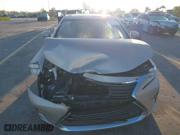 2016 Lexus ES 300h z VIN JTHBW1GG4G2106710, wystawiony jako IAAI lot #41684479 z przebiegiem 144 559 mil mil oraz . Historia ofert i sprzedaży dostępna na DreamBid. Obrazek 6.