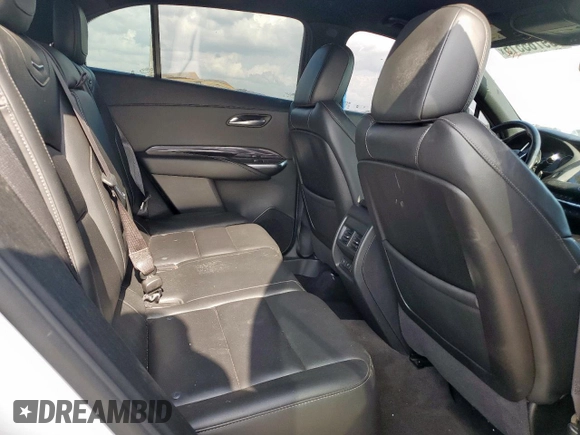 2021 Cadillac XT4 FWD Luxury z VIN 1GYAZAR49MF084676, wystawiony jako Copart lot #59765515 z przebiegiem 32 480 mil mil oraz Czysty tytuł • Clean title. Historia ofert i sprzedaży dostępna na DreamBid. Obrazek 10.
