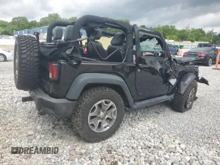 2015 Jeep Wrangler Rubicon with VIN 1C4HJWCG0FL755717, listed as a Copart auction lot 61375435 with 153,207 mi miles and Salvage title. Bid and sale history available at DreamBid. Image 3.