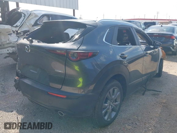 2025 Mazda CX-30 S Carbon Edition z VIN 3MVDMBCMXSM770060, wystawiony jako IAAI lot #42236673 z przebiegiem Nie podano mil oraz . Historia ofert i sprzedaży dostępna na DreamBid. Obrazek 4.