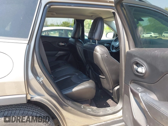 2019 Jeep Cherokee Latitude Plus with VIN 1C4PJMLN8KD148533, listed as a IAAI auction lot 42480637 with 63,473 mi miles and . Bid and sale history available at DreamBid. Image 8.
