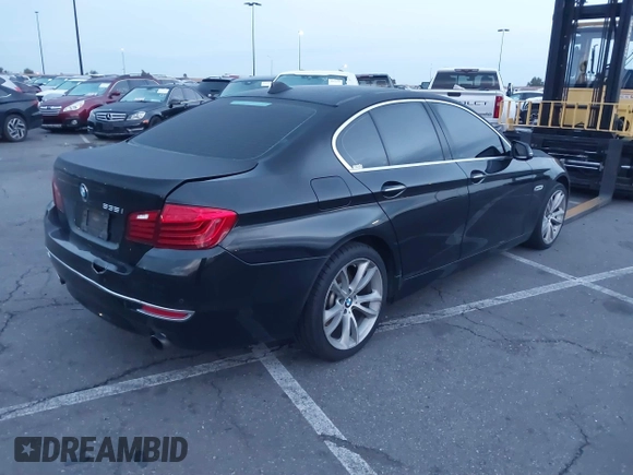 2014 BMW 5 Series 535i with VIN WBA5B1C54ED917047, listed as a IAAI auction lot 41727855 with 105,460 mi miles and . Bid and sale history available at DreamBid. Image 4.