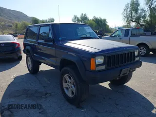 1996 Jeep Cherokee z VIN 1J4FT27S2TL156171, wystawiony jako IAAI lot #41578009 z przebiegiem 161 095 mil mil oraz . Historia ofert i sprzedaży dostępna na DreamBid. Obrazek 1.