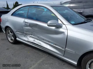 2004 Mercedes-Benz CLK-Class 5.0L with VIN WDBTJ75J34F071716, listed as a IAAI auction lot 41818093 with 100,142 mi miles. Bid and sale history available at carsss.com. Image 6.