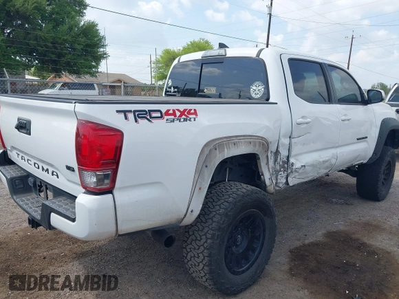 2017 Toyota Tacoma SR5 z VIN 5TFCZ5AN1HX116806, wystawiony jako IAAI lot #41839628 z przebiegiem 90 197 mil mil oraz . Historia ofert i sprzedaży dostępna na DreamBid. Obrazek 4.