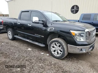 2016 Nissan Titan XD Platinum Reserve with VIN 1N6BA1F29GN512094, listed as a Copart auction lot 84119894 with 121,893 mi miles and Clean Title. Bid and sale history available at carsss.com. Image 4.