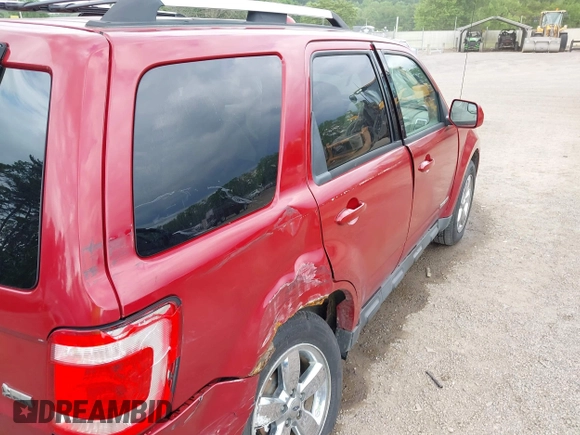 2010 Ford Escape Limited z VIN 1FMCU0EG5AKC21828, wystawiony jako IAAI lot #42343582 z przebiegiem 135 534 mil mil oraz . Historia ofert i sprzedaży dostępna na DreamBid. Obrazek 18.