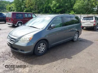 2007 Honda Odyssey EX z VIN 5FNRL38477B406473, wystawiony jako IAAI lot #42364081 z przebiegiem 214 511 mil mil oraz . Historia ofert i sprzedaży dostępna na DreamBid. Obrazek 2.