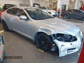 2015 Jaguar XF I4 T Premium with VIN SAJWA0FS1FPU47163, listed as a IAAI auction lot 41294466 with 117,983 mi miles. Bid and sale history available at carsss.com. Image 1.