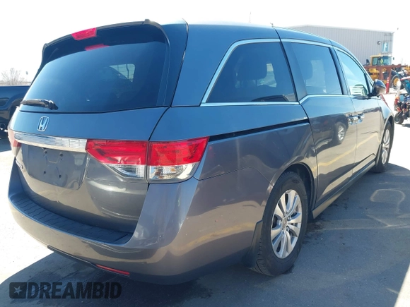2015 Honda Odyssey EX-L with VIN 5FNRL5H66FB063215, listed as a IAAI auction lot 41846532 with 153,048 mi miles and . Bid and sale history available at carsss.com. Image 4.