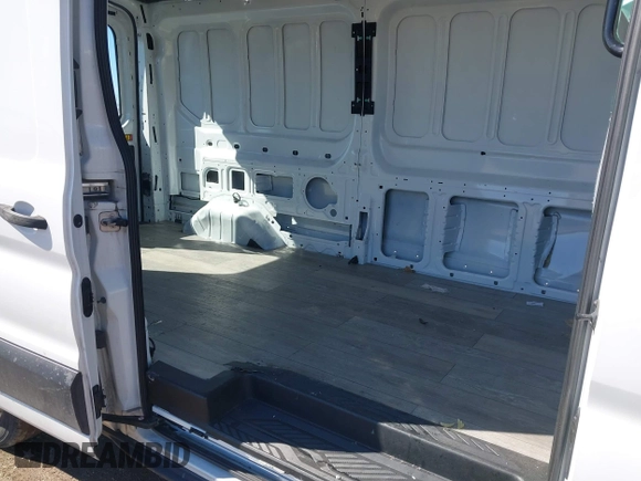 2019 Ford Transit with VIN 1FTYR2CM6KKB24493, listed as a IAAI auction lot 41724796 with 193,569 mi miles and . Bid and sale history available at DreamBid. Image 8.