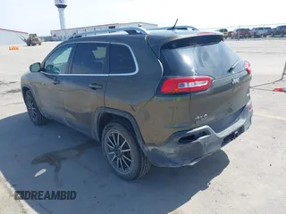 2015 Jeep Cherokee North with VIN 1C4PJMCS9FW588826, listed as a IAAI auction lot 41952883 with 145,586 mi miles. Bid and sale history available at carsss.com. Image 3.