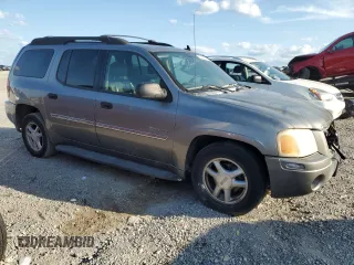 2006 GMC Envoy SLE with VIN 1GKET16S766147308, listed as a Copart auction lot 71669374 with 237,254 mi miles and Salvage Title. Bid and sale history available at DreamBid. Image 4.