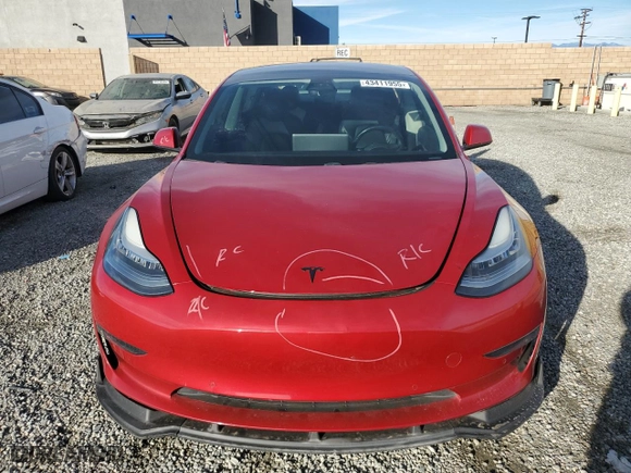 2019 Tesla Model 3 Mid Range with VIN 5YJ3E1EA4KF396489, listed as a Copart auction lot 43411955 with 65,384 mi miles and Salvage Title. Bid and sale history available at carsss.com. Image 5.